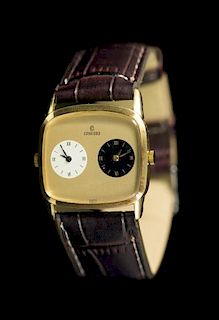 A 14 Karat Yellow Gold Dual Time Wristwatch, Concord,