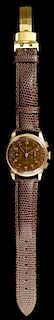 An 18 Karat Rose Gold Wristwatch, Chronograph Suisse,