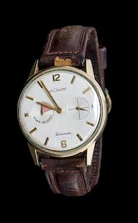 * A 10 Karat Gold Filled Yellow Gold Futurematic Wristwatch, LeCoultre,