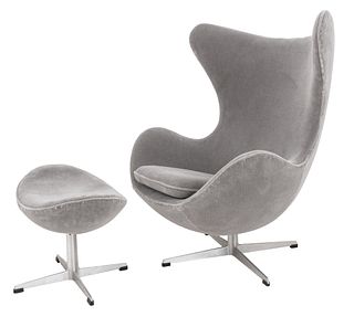 Aarne Jacobsen (Danish, 1902-1971) for Hansen Mid-Century Modern egg chair and ottoman or stool, designed 1958, of typical form, recently upholstered 
