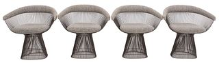 Four Warren Platner (American, 1919-2006) for Knoll dining chairs or arm chairs, designed 1966, each upholstered on back, arms, and seat in Knoll gray