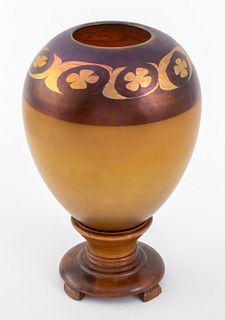 Louis Comfort Tiffany (American, 1848-1933) Tel-el-Amarna favrile glass vase on stand, of ovoid form, the iridescent gold-honey-tone body with a deep 