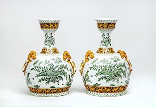 Pair of French Faience Urns with Ram's Head Handles