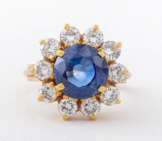 Ceylon unheated sapphire diamond 18K yellow gold ring with AGL report; brightly polished, featuring centered prong set round mixed cut blue sapphire, 