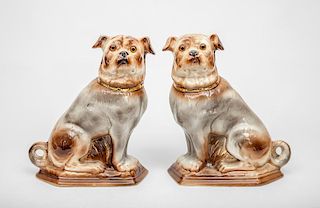 Pair of Modern Staffordshire Pottery Figures of Seated Pug Dogs