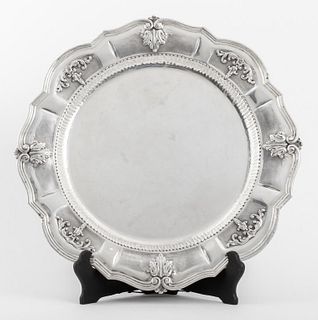 Italian Baroque style sterling silver tray, with shaped edge and rim divided with cartouches with acanthus leaves and bellflowers around the cavetto, 