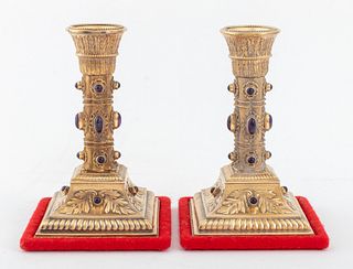 Pair of Judaica gilded silver amethyst gem set repousse silver Shabbat candlesticks in the Renaissance Style, possibly Italian, with beaded drip pans 