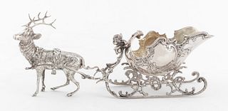 German or Austrian 800 silver figural table salt cellar, in the form of stag-drawn Baroque sleigh, the interior gilded, apparently unmarked. Weight: 1