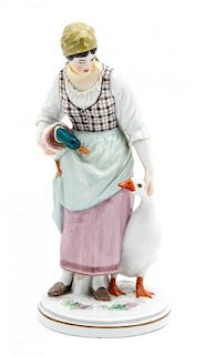 A Meissen Porcelain Figural Group, Height 9 3/4 inches.