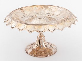 Victorian sterling and coin silver centerpiece bowl in a "Gothick" style and mounted with 69 coins from the Hanoverian period, with various marks, inc