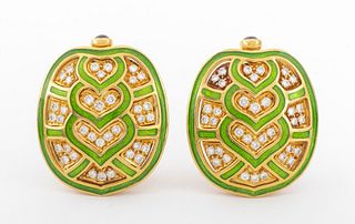 Judith Lieber designed 18K gold, diamond, and sapphire clip earrings, fabricated in 18K yellow gold, brightly polished and decorated with green enamel