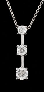 14K white gold three diamond drop pendant necklace, designed as a diamond set vertical bar, featuring 3 prong set round brilliant cut diamond, I-K col