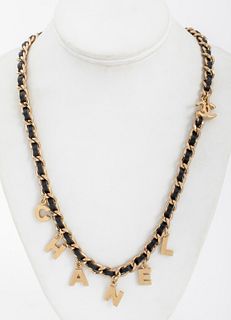 Chanel Runway black leather and gold-tone metal chain link necklace with "C-H-A-N-E-L" and signature double-C logo charms, Summer 2004, marked "(c) CH