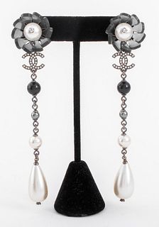 Pair of Chanel Runway faux pearl pendant drop earring clips in gunmetal-tone metal, the faux pearl drops suspending from rhinestone crystal mounted si