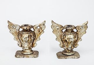 Pair of Italian Baroque Carved and Silvered Wood "Winged" Candlesticks and a Pair of Italian Giltwood Pricket Sticks