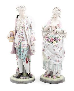 Two German Porcelain Figures, Height of each 22 inches.