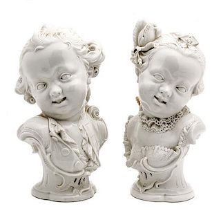 A Pair of Nymphenburg Blanc de Chine Busts, Height 10 7/8 inches.