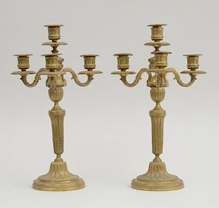 Pair of Louis XVI Style Gilt-Metal Four-Light Candelabra