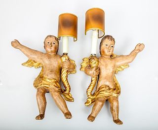 Pair of Italian Rococo Style Painted and Parcel-Gilt Wood Cherub-Form Wall Sconces