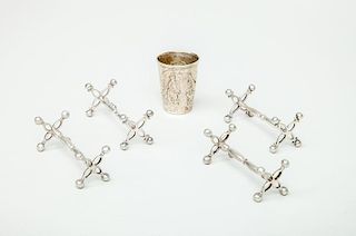 Assembled Group of Four George IV Silver Knife Rests and a Continental Repoussé Silver Cup