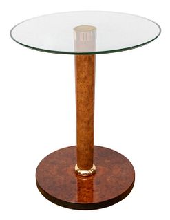 Versace Home side table with circular glass top above tapering columnar support in fantasy burlwood lacquer finish on gold socle above a circular base