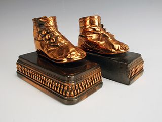 CAST BABY SHOES BOOKENDS