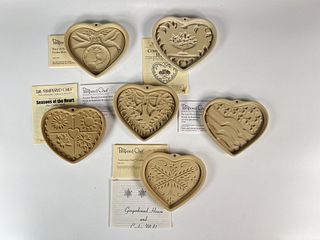 SIX PAMPERED CHEF COOKIE MOLDS IN BOX