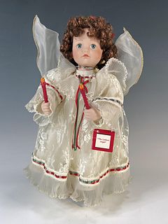 MUSICAL CHRISTMAS DOLL WITH MOVEMENT NUMBERED