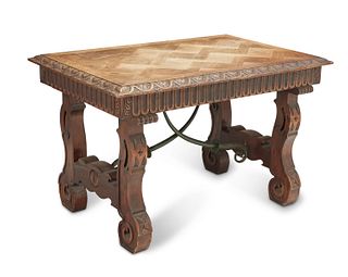 A French parquetry and carved oak trestle table, Early 20th century; Nord, France