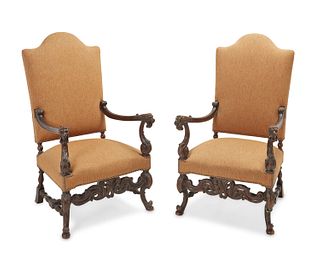 A pair of Italian carved walnut hall chairs