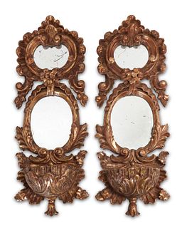 A pair of Venetian-style giltwood wall mirrors