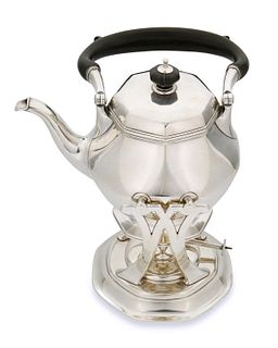 A Tiffany & Co. sterling silver tipping kettle
