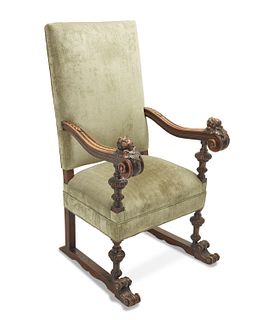 An Italian carved walnut and velvet upholstered hall chair