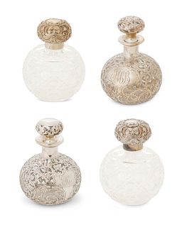 A group of sterling silver and glass vanity bottles