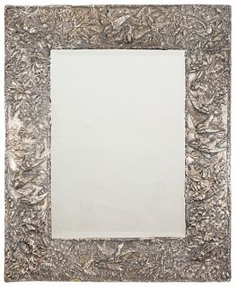 A silver repoussE mirror