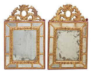 A pair of Flemish-style giltwood wall mirrors