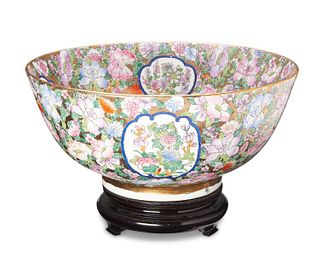 A Chinese gilt and polychrome enameled porcelain bowl