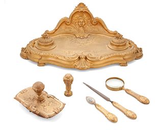 A French Louis XV-style gilt-bronze desk set