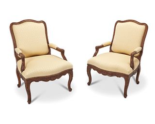 A pair of Louis XV-style armchairs