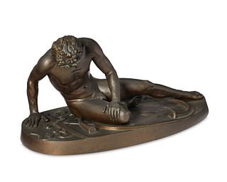 A bronze sculpture in the manner of the "The Dying Gaul"