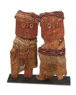 Two Incan Chimu carved wood figures with cloth garments
