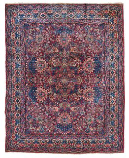 A Persian Kerman variety rug