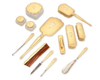 An International 14k gold vanity set