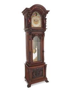 A Horner-style carved wood tall case clock