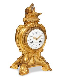A French gilt-bronze mantel clock