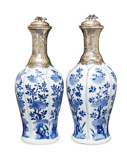 A pair of Chinese export Dutch silver-mounted porcelain dresser bottles
