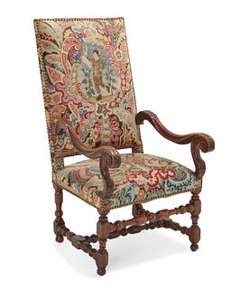 A French Louis VXIII-style tapestry and walnut armchair