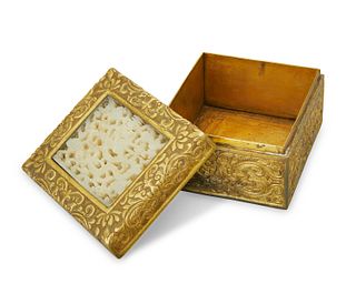 A Chinese brass and carved jade vanity box