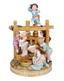A Meissen "The Wine Pressers" porcelain figural group