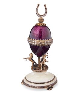 A FabergE-style enameled silver egg
